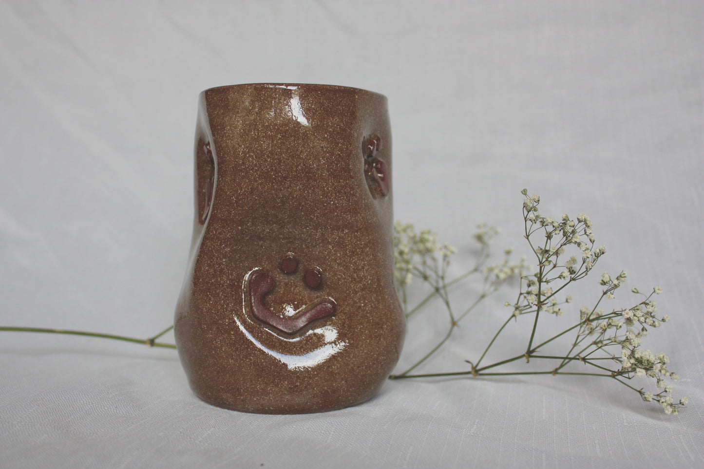droll smile cup